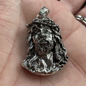 Silver Christ Head Pendant on Silver Necklace